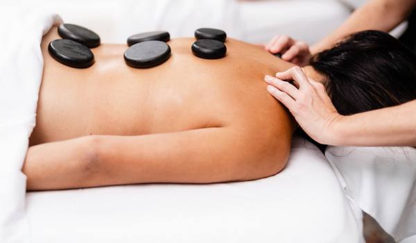 Stay Warm This Winter with a Hot Stone Massage