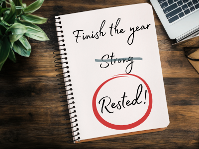 Notebook with writing: Finish the year (strong is struck out) rested! from Firefly Spa in San Diego
